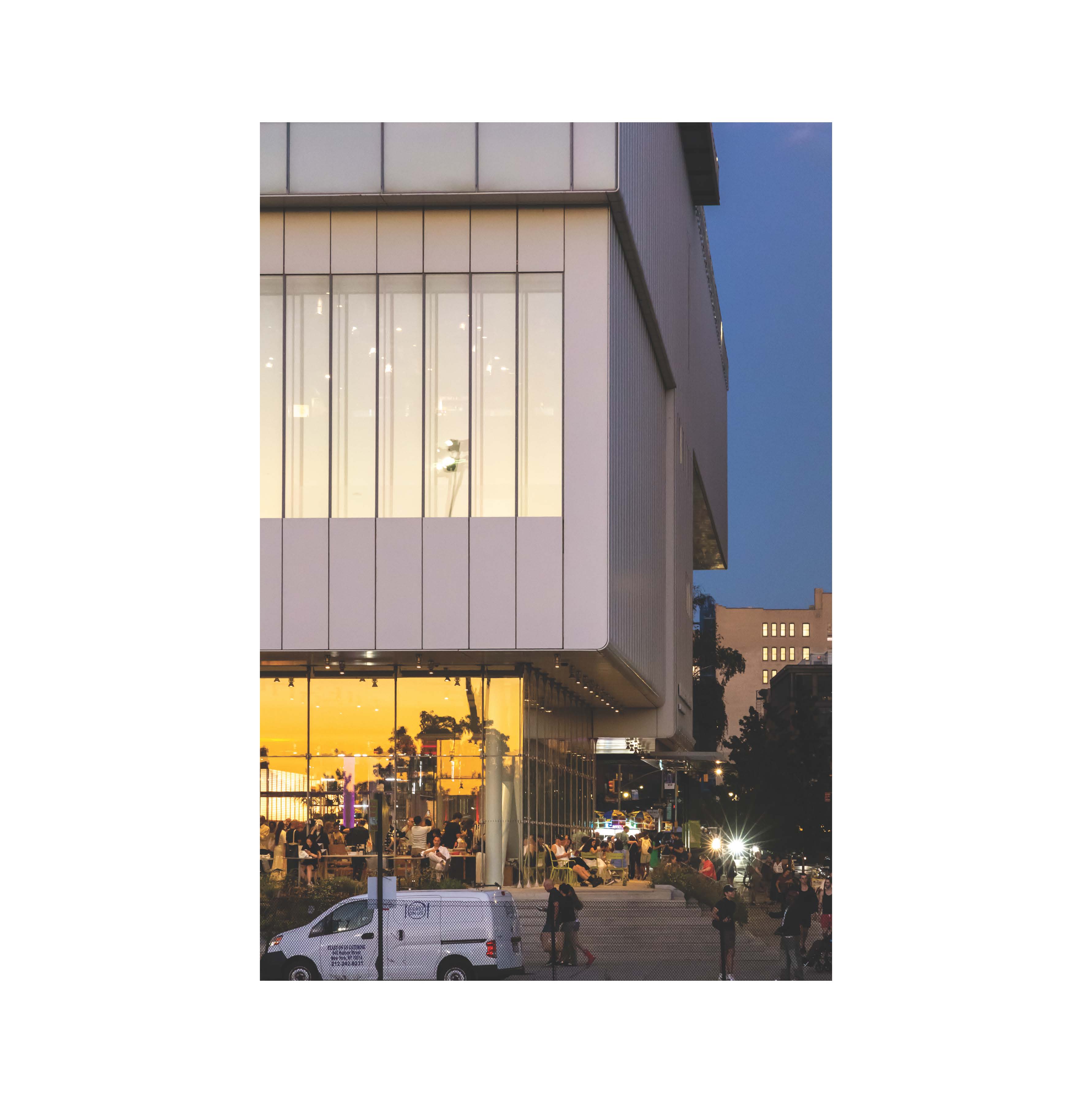 Illuminated museum and street at twilight