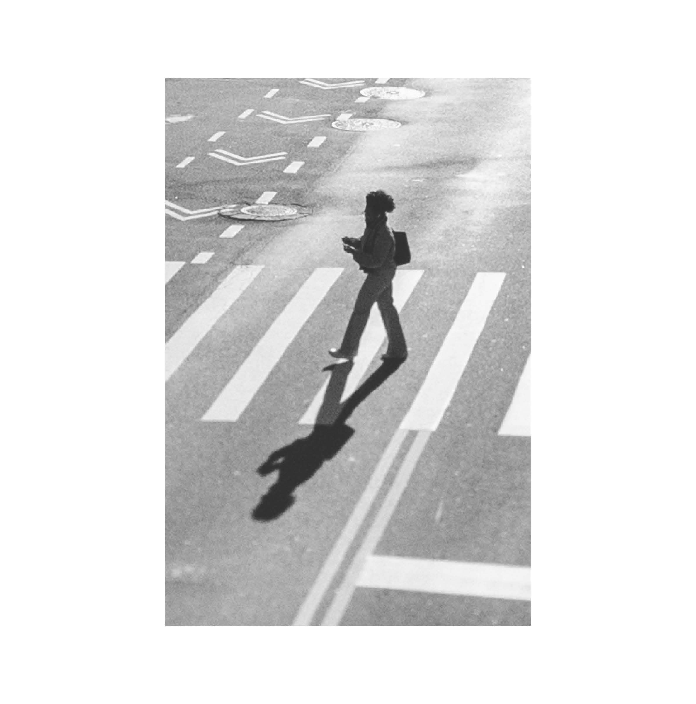 Walking figure and shadow
