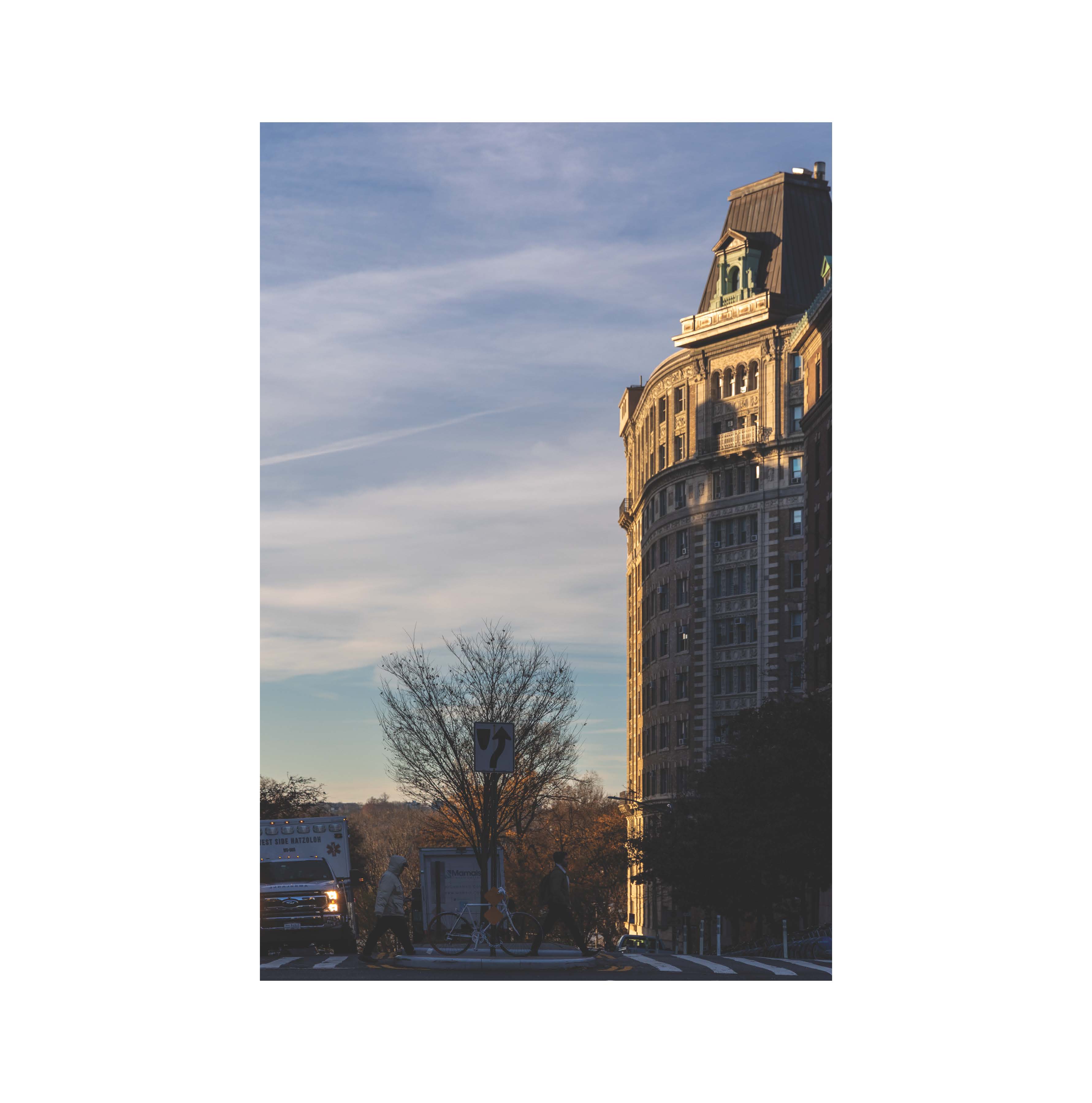 Evening sunlight on a street corner building